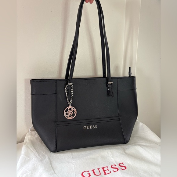 Guess Handbags - ✨ Guess Medium Tote with Logo Charm – 9/10 ✨